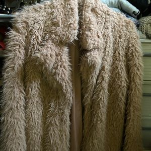 Shaggy beige coat